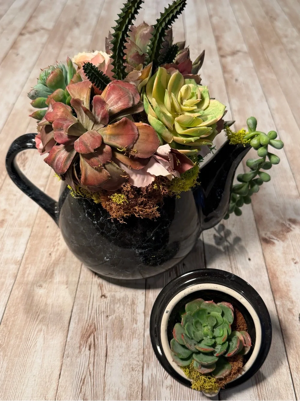 Black Ceramic Teapot Planter with Pink-Green Faux Succulent Arrangement